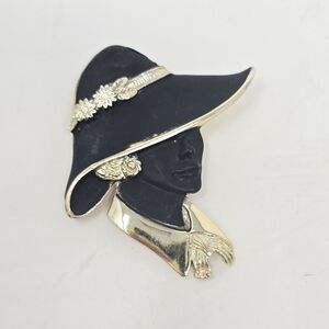 Vintage torino lady head in hat brooch black enamel gold tone.